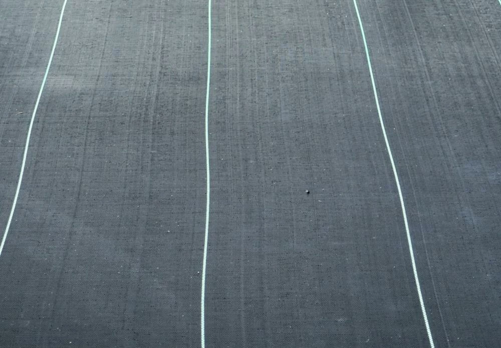 RSI Landscape Fabric & Stakes Premium Landscape Fabric (Common: 4-ft x 300-ft; Actual: x 300-ft) 4 RSI Landscape Fabric & Stakes Premium Landscape Fabric (Common: 4-ft x 300-ft; Actual: x 300-ft) - Image 4